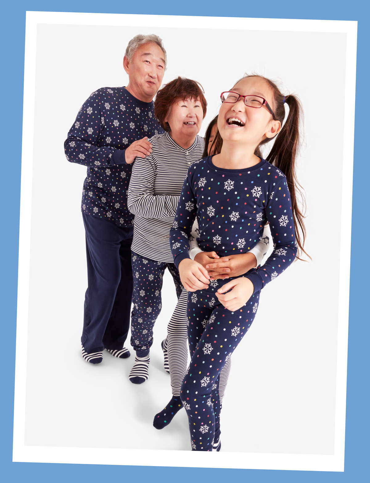 A family wearing PJs from our snowy days collection